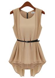 beige top with a thin black belt